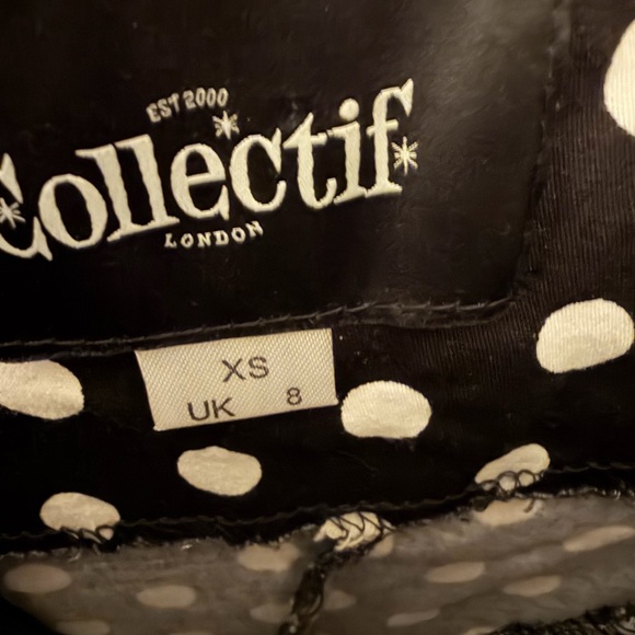 Collectif Black Dress with White Polka Dots and cherry accents - Picture 2 of 3